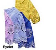 Eyelet fabric and trims delicate feminine look